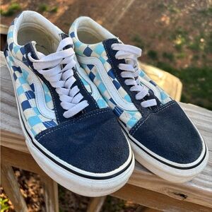 Woman’s blue checkered Vans